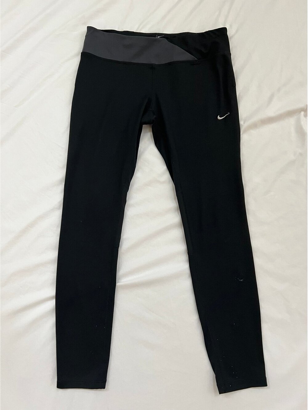 Nike women’s size large black/grey athletic “Twisty Leggings”